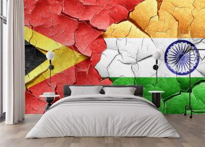 east timor flag with India flag on a grunge cracked wall Wall mural