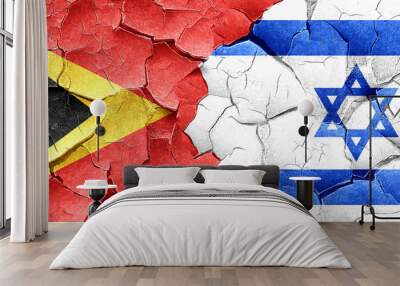 east timor flag with Israel flag on a grunge cracked wall Wall mural