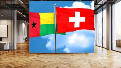 Guinea bissau flag with Switzerland flag, 3D rendering Wall mural