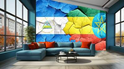 nicaragua flag with Ethiopia flag on a grunge cracked wall Wall mural