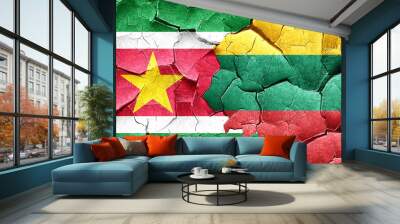 Suriname flag with Lithuania flag on a grunge cracked wall Wall mural