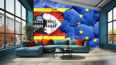 Swaziland flag with european union flag on a grunge cracked wall Wall mural