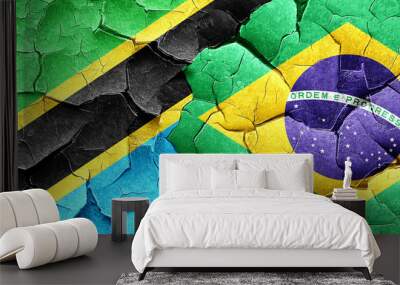 Tanzanian flag with Brazil flag on a grunge cracked wall Wall mural