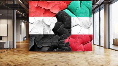 Yemen flag with Kuwait flag on a grunge cracked wall Wall mural