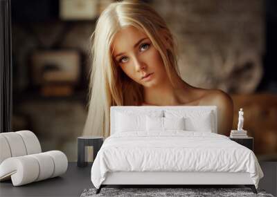 Beautiful young female blonde model Wall mural