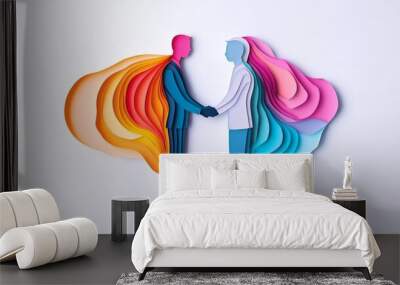 Colorful paper art silhouette of two people shaking hands, symbolizing unity and collaboration with vibrant flowing colors. Wall mural