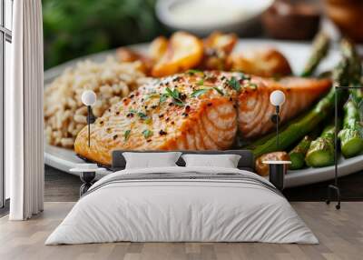 Delicious grilled salmon served with rice, roasted vegetables, and fresh herbs on a plate. Perfect for a healthy and nutritious meal. Wall mural