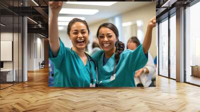 two nurses laughing and talking in a hospital, showcasing positivity, camaraderie among healthcare workers Wall mural