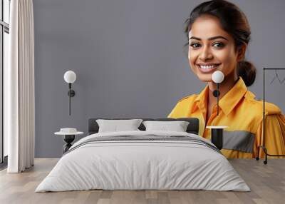 Indian woman in public transportation uniform on pastel background Wall mural