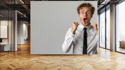 White people businessman in white shirt raised fist with surprise face Wall mural