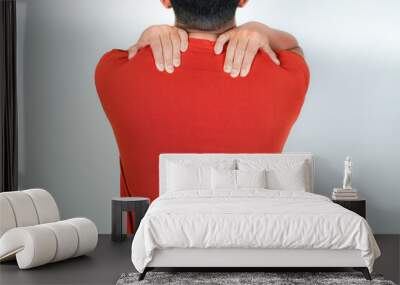 A man has chronic lower back pain and suffers from lower back pain Wall mural