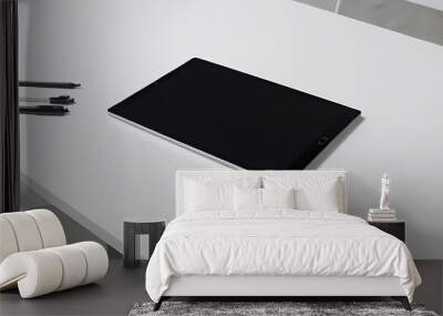 Tablet on a White Table Wall mural