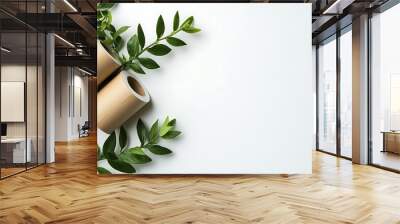 Two Rolls of Paper with Green Leaves on White Background Wall mural