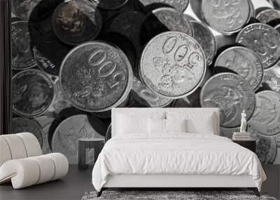 A pile of rupiah coins which is the currency of Indonesia that build from alumunium material Wall mural