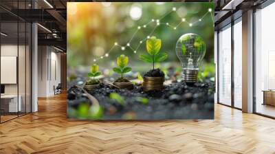 Green energy, eco energy concept. Trees growing on coin stacks symbolize green investments. A graph with renewable energy icons shows growth, an Earth-filled light bulb highlights the global impact.  Wall mural