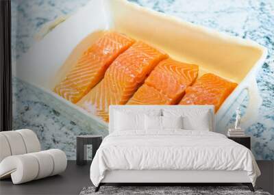 Arranging fresh salmon for teriyaki oven baking Wall mural