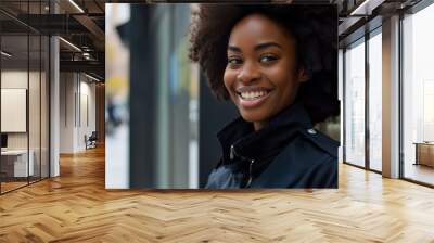 Afro woman wearing security guard or safety officer uniform on duty Wall mural