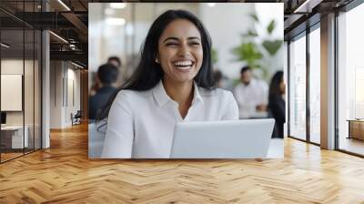 Indian business woman happy working using laptop at office workplace Wall mural