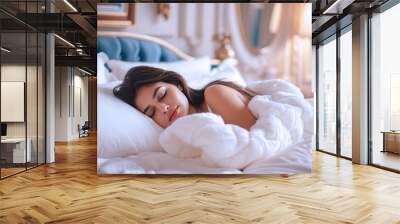 Pakistani woman sleeping peacefully in the bedroom of a luxury hotel Wall mural