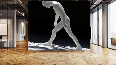 A striking sculpture of a human figure walking on an abstract surface, evoking themes of struggle and exploration. Wall mural