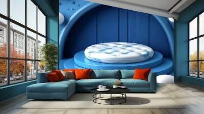 A vibrant blue platform with a textured circular cushion, perfect for showcasing products in a contemporary design setting. Wall mural