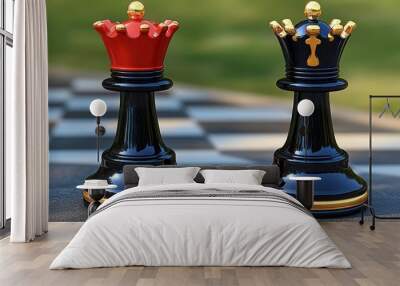 Two elegant chess queens in contrasting colors stand on a chessboard, highlighting strategic gameplay and competition. Wall mural