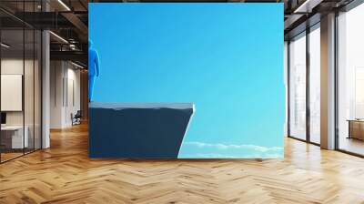 Two figures, one red and one blue, stand at the edge of a cliff against a bright blue sky, symbolizing choices and differences. Wall mural