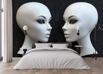 Two minimalist mannequin heads facing each other, showcasing modern design and artistic features in a stylish composition. Wall mural