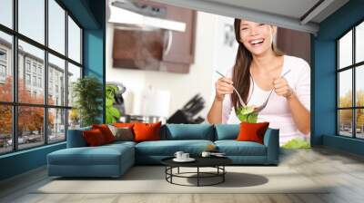 woman making salad in kitchen Wall mural