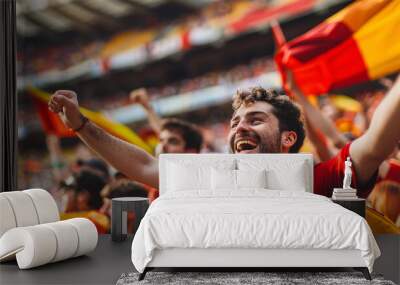 Spain football supporter fans cheering with confetti watching soccer match event at stadium - Young people group with red and yellow t-shirts having excited fun on sport european championship concept Wall mural