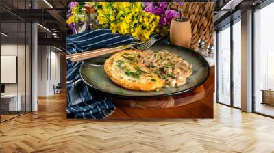 Crispy potato pancakes with mushroom sauce Wall mural