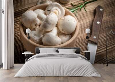 Fresh white champignon mushrooms. Wall mural