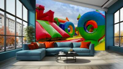 Inside inflatable, colorful castle in playground Wall mural