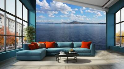 The cloudy sky with dark blue water of the Murray River, is a river in south-eastern Australia. It is Australia's longest river at 2,508 km, which covers about one-seventh the area of Australia. Wall mural