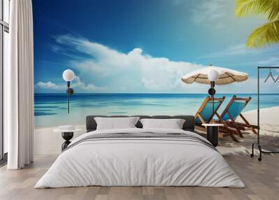 Two beach chairs with an umbrella in summer vacation and a blue sky for ultimate relaxation. Wall mural