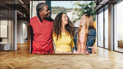 Multiracial young people walking happily on the street - Guys and girls having fun together - Lifestyle concept - Selective focus. Wall mural