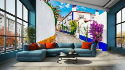 Typical street of the medieval village of Óbidos in Portugal . Wall mural