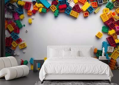 The lego bricks of different shapes and sizes to show diversity. White background, white space in the center of picture. A pile of colorful Lego blocks scattered all over the place.  Wall mural