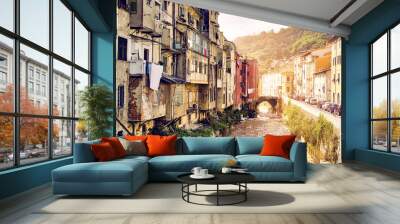 Carrara Italy, creek and old poor houses Wall mural