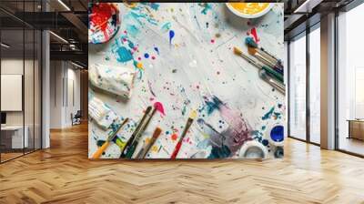 Top view of a craft table with various art supplies like paints, brushes, and paper, with an open area on the right for customization Wall mural