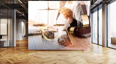 Business and lawyers discussing contract papers with brass scale on desk in office. Law, legal services, advice, justice and law concept picture with film grain effect Wall mural