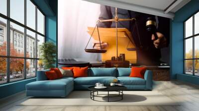 Business and lawyers discussing contract papers with brass scale on desk in office. Law, legal services, advice, justice and law concept picture with film grain effect Wall mural