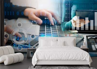 businesswoman hand using smart phone, tablet payments and holding credit card online shopping, omni channel, digital tablet docking keyboard computer at office in sun light Wall mural