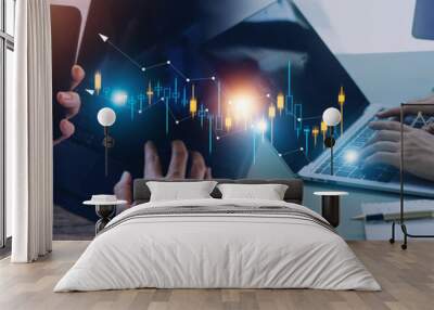 Hand of Businessman or trader is showing a growing virtual hologram stock on smartphone, planning and strategy, Stock market, Business growth, progress or success concept. invest in trading. Wall mural