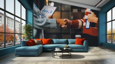 Meeting and greeting concept, Two confident Business handshake and business people after discussing good deal of Trading contract and new projects for both companies, success, partnership, co worker. Wall mural