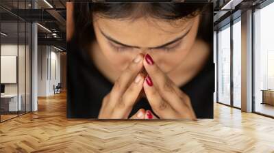 Portrait of a stressed woman on color background, sad depressed young girl isolated Wall mural