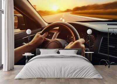 hands of car driver on steering wheel, road trip, driving on highway road. Wall mural