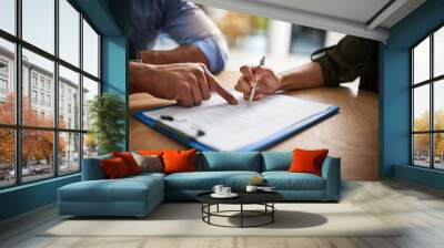 Lawyer, broker or HR manager signing a contract agreement with client or employee. Financial advisor asking for womans signature for insurance, legal paperwork or claim document Wall mural