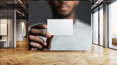 Close-up of a Hand Holding a Blank Business Card Wall mural