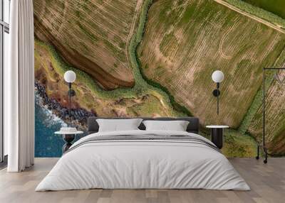 Aerial top view seascape. Natural drone landscape view in the Azores islands. Abstract pattern with amazing textures. Atlantic coast of São Miguel Island, Portugal. Wall mural